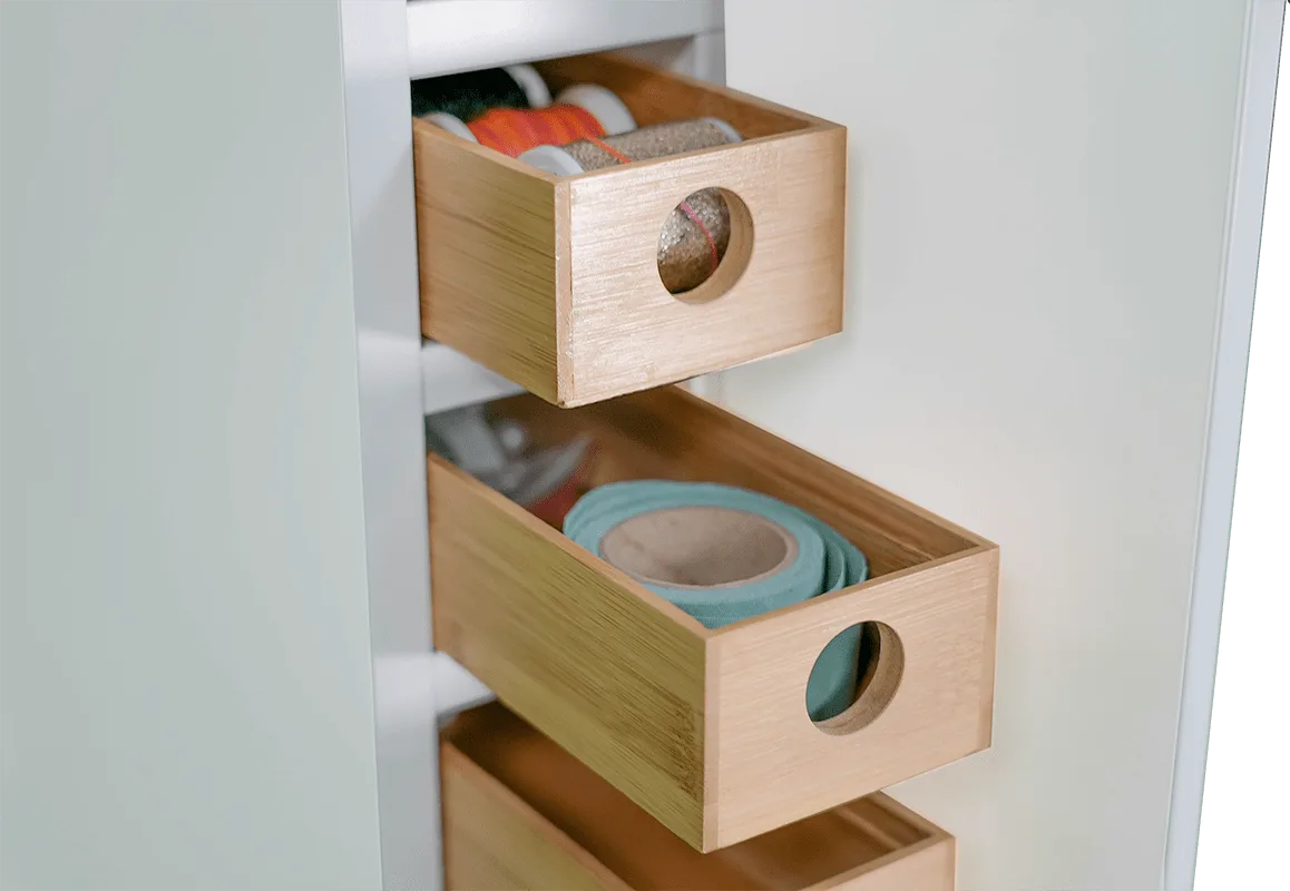 Bamboo drawers detail on Baby Lock demo cabinet