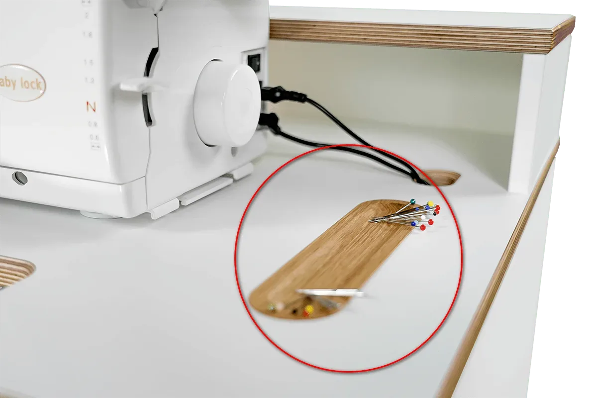 Magnetic pin shelf on Baby Lock demo cabinet