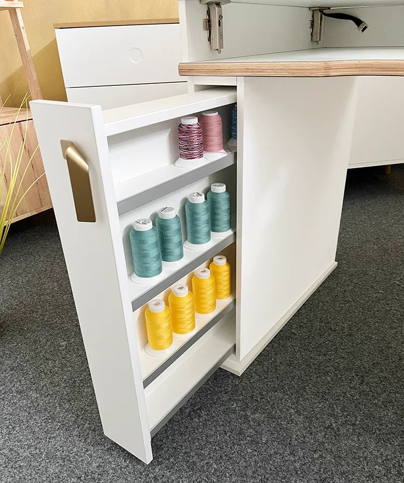 Pull-out thread rack detail on Baby Lock demo cabinet