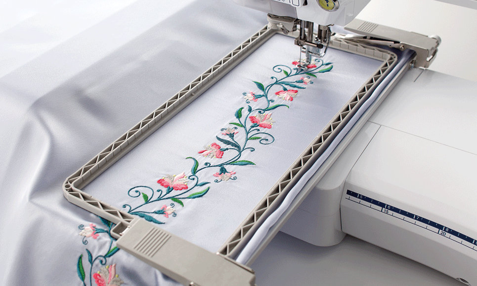 Brother BF3 300 x 100mm border embroidery frame stitching a continuous floral design; machine not included