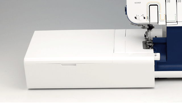 Brother SERGERWT extension table fitted to a 4234D-series overlocker; machine not included