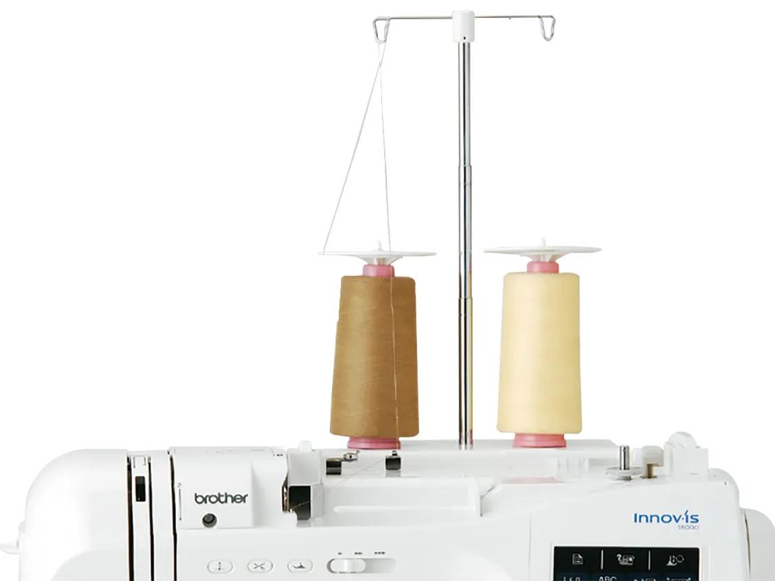 Brother TS3 SA542 two-spool stand mounted on a machine; machine and threads not included
