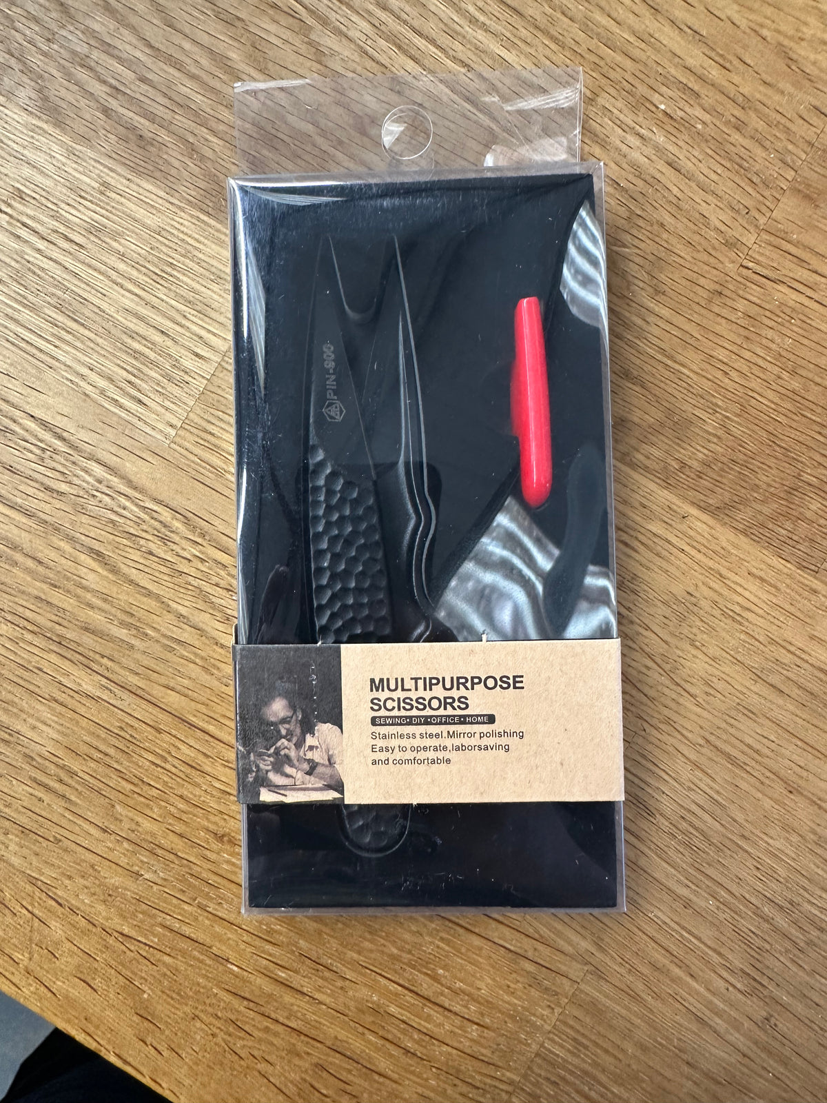 PIN-900 black thread snips in their retail packaging